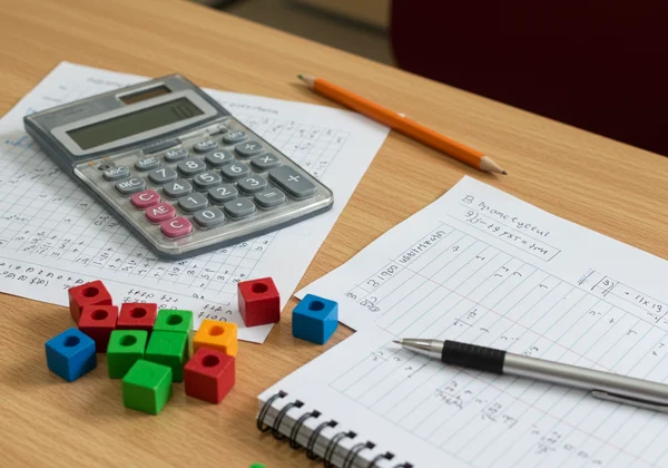 Classroom desk with dyscalculia learning tools